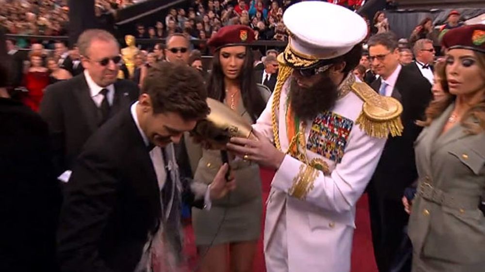 Sacha Cohen Baron Spills Ashes on Ryan Seacrest