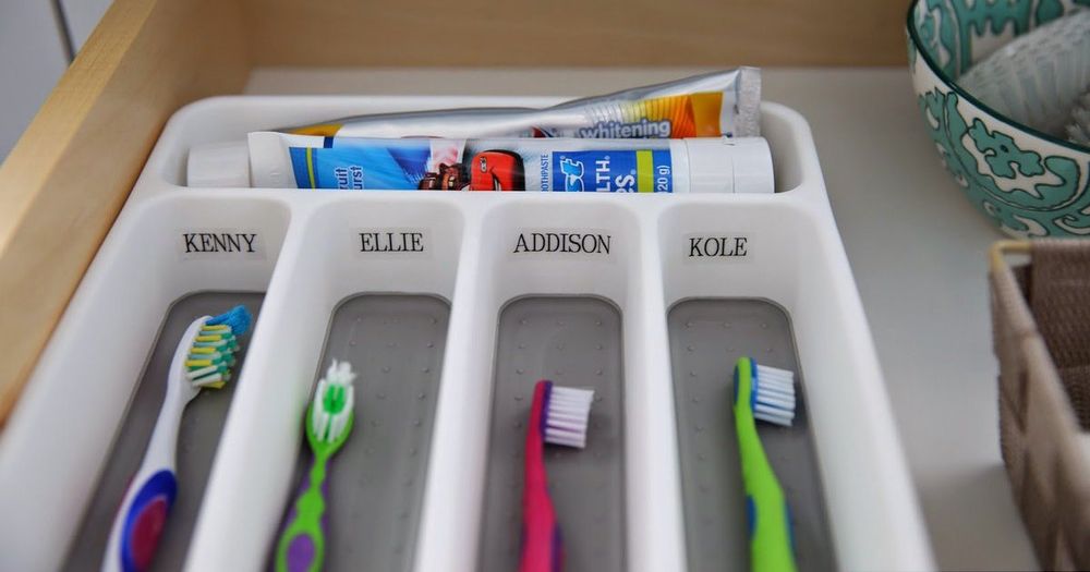 Organize Toothbrushes Using Silverware Organizers 